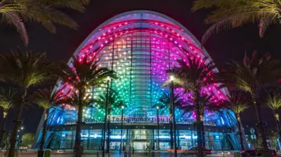 a building with pink and blue lights on it at Peaceful Oasis in Anaheim