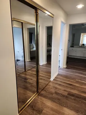 a large mirror on a wall in a room at Travelers Mini Stays - Revelation Nation Welcome in Simi Valley