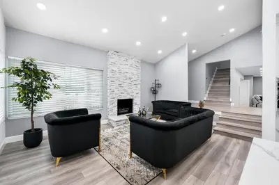 a living room with two couches and a fireplace at Spacious 4-bedroom Glendora Super House in Glendora