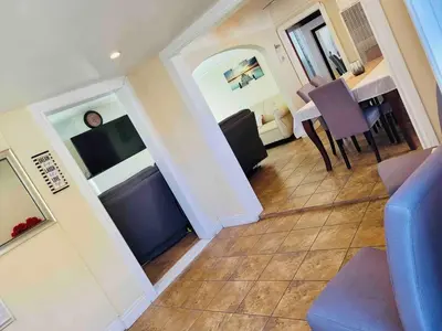 an overhead view of a living room and dining room at Cozy Spacious, free parking, near it all in South Gate