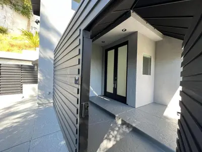 a door on the side of a house at Hollywood Hills Luxury Nest in Los Angeles