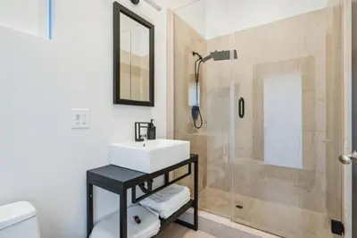 a bathroom with a sink and a shower at Hollywood Hills Luxury Nest in Los Angeles