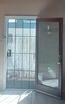 a room with a large glass door with a window at 2bd Home Lomita California spectacular location in Lomita
