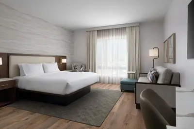 a hotel room with a bed and a window at TownePlace Suites by Marriott Ventura Oxnard in Oxnard