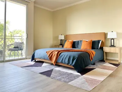 a bedroom with a bed and a large window at Modern Top Floor 3BD 3BA Condo Marina del Rey in Los Angeles