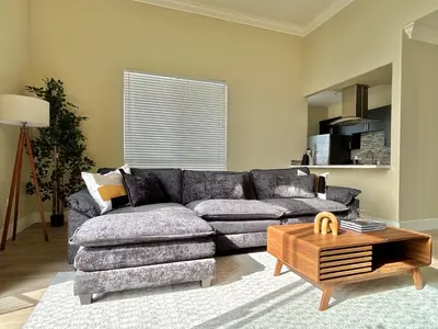 a living room with a couch and a coffee table at Modern Top Floor 3BD 3BA Condo Marina del Rey in Los Angeles