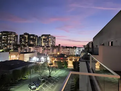 a view of a city at night with buildings at Modern Venice Beach Stay - Walk to Marina & Boardwalk in Los Angeles