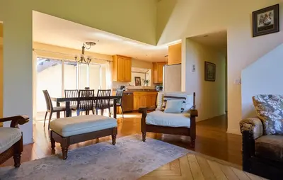 a kitchen and dining room with a table and chairs at Malibu Home in Enchanting Hills 5 min from the beach in Malibu