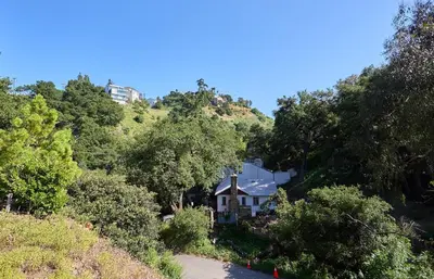 a house on the side of a hill at Malibu Home in Enchanting Hills 5 min from the beach in Malibu