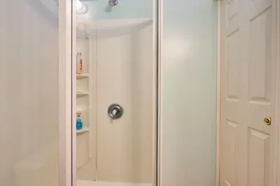 a shower with a glass door in a bathroom at Malibu Home in Enchanting Hills 5 min from the beach in Malibu