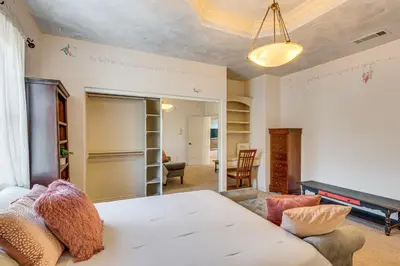 a room with a bed and a couch and a living room at 6 Mi to Dtwn Pasadena Home with Patio and Yard! in San Gabriel