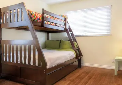 a bunk bed in a room with a bunk bedutenewayewayangering at MagicwayVillas LionQueen - Pool and Spa in Anaheim