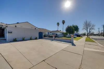 a sidewalk with a street light on it at 35 Mi to LA Modern Apartment in Chino! in Chino