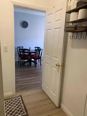 a door leading into a dining room with a table at Private Sanctuary in Montebello in Montebello