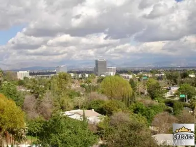 a view of a city with trees and buildings at Private Room View Gated 2Acre Estate - Female Share Indoor - Men Share Outdoor - BB in Engine Company Number 109 Heliport