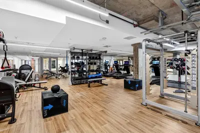a gym with lots of treadmills and machines at Modern Hollywood Studio, Pool Parking Gym in Los Angeles