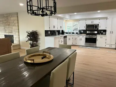 a kitchen and dining room with a table and chairs at Private Hillside Home with View - Yaamava - NOS in San Bernardino