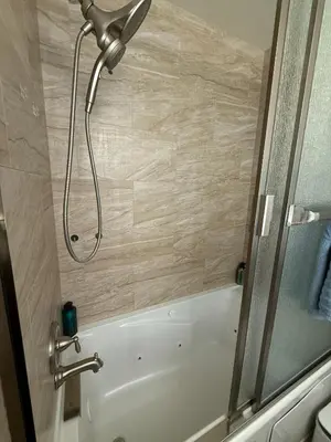 a shower in a bathroom with a white bath tub at Oceanfront 1 BR Oasis w Parking & Pool 417 in Redondo Beach