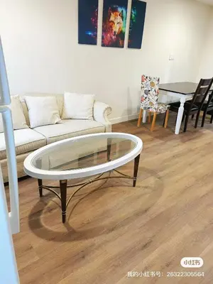 a living room with a couch and a glass table at Luxury suite private entrance in Hacienda Heights