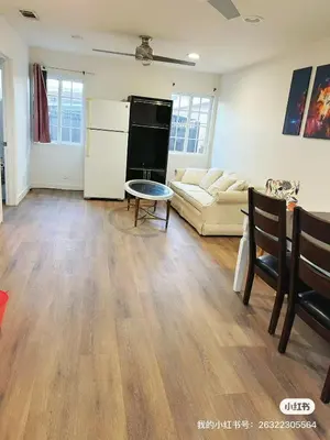 a living room with a couch and a table at Luxury suite private entrance in Hacienda Heights