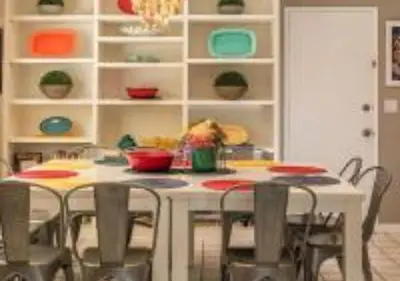 a dining room with a table and chairs at MagicwayVillas TeaCup Pool House - Walking Distance to Disneyland in Anaheim