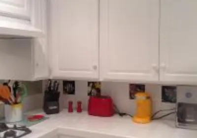 a kitchen with white cabinets and a counter top at MagicwayVillas TeaCup Pool House - Walking Distance to Disneyland in Anaheim