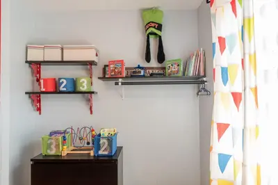 a room with shelves on the wall with toys on it at Magicwayvillas Micky's Playground Pool & Spa - Walking TO Disney in Anaheim