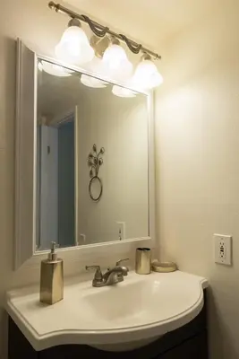 a bathroom sink with a large mirror above it at Magicwayvillas Micky's Playground Pool & Spa - Walking TO Disney in Anaheim