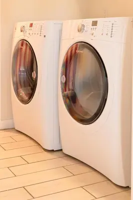 two white washing machines sitting next to each other at Magicwayvillas Micky's Playground Pool & Spa - Walking TO Disney in Anaheim