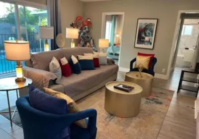 a living room with a couch and two chairs at MagicwayVillas HeroHouse Pool and Spa in Fullerton