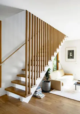 a living room with a staircase and a couch at San Juan Featured in Architectural Digest Plus Sauna in Los Angeles