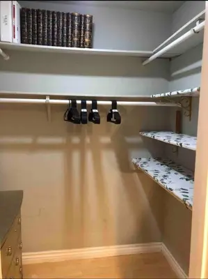 a kitchen with coffee cups hanging on a shelf at Best Location West LA Spacious condo with hottub in Los Angeles
