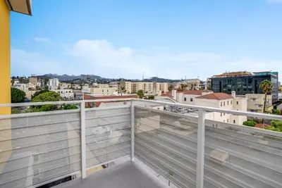 a balcony with a view of the city at View of Hollywood Sign Studio, Free Parking in Los Angeles