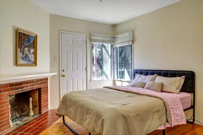 a bedroom with a bed and a fireplace at Entire House,Convinient location in Los Angeles , near Universal, Hollywood, Pets Friendly, Free WIFI in Sherman Oaks Community Hospital Heliport