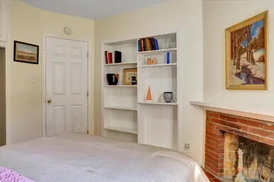 a living room with a fireplace and a bed at Entire House,Convinient location in Los Angeles , near Universal, Hollywood, Pets Friendly, Free WIFI in Sherman Oaks Community Hospital Heliport