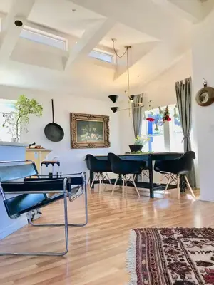 a living room with a table and chairs at Ojai Wilderness Off-The-Grid Sespe House in Ojai