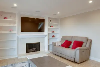 a living room with a couch and a fireplace at 2 Mi to Promenade at Westlake Mtn-View Haven! in Westlake Village
