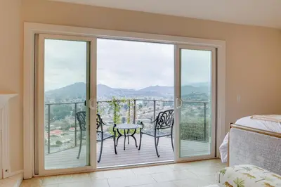 a bedroom with a balcony with a table and chairs at 2 Mi to Promenade at Westlake Mtn-View Haven! in Westlake Village
