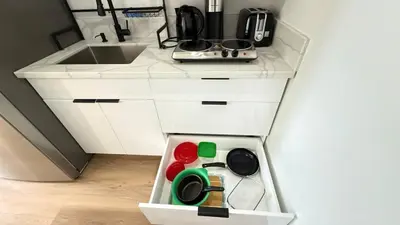 a kitchen with a sink and a white counter top at Modern Studio Stylish &Cozy Right Unit in Los Angeles