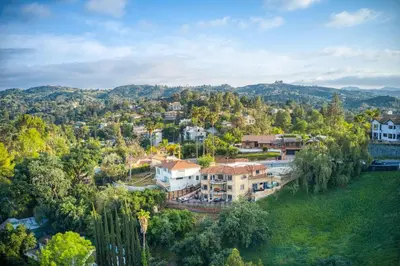 an aerial view of a town with trees and houses at Luxury Modern w/ Great LA Views in Woodland Hills