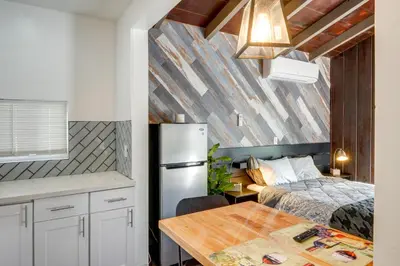 a kitchen and a bedroom with a bed and a table at Private Deck and Views Frazier Mountain Cabin in Frazier Park
