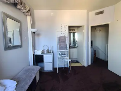 a room with a bed and a kitchen with a sink at Guest Room in Sherman Oaks with private bathroom and balcony in Sherman Oaks