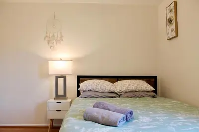 a bedroom with a bed with two pillows on it at Los Angeles Cherry Blossom in Monterey Park