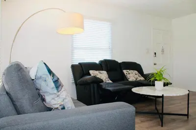 a living room with a couch and a table at Los Angeles Gem in Monterey Park