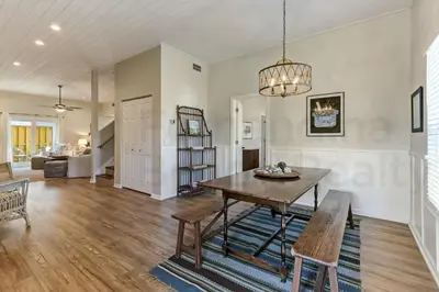 a dining room and living room with a table and chairs at Particle Ocean View 2505B W 5th St in Los Angeles