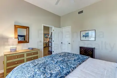 a bedroom with a bed and a dresser and a mirror at Particle Ocean View 2505B W 5th St in Los Angeles