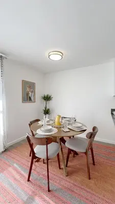 a dining room with a table and chairs at Seaside Escape Steps from Santa Monica Beach in Los Angeles