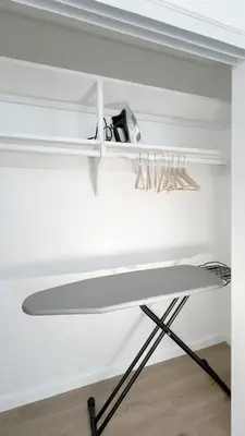 a surfboard on a shelf in a room at Seaside Escape Steps from Santa Monica Beach in Los Angeles