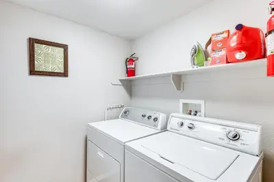 a laundry room with a washer and dryer at Swim, Hike, Ski and Unwind Lake Arrowhead Retreat! in Lake Arrowhead