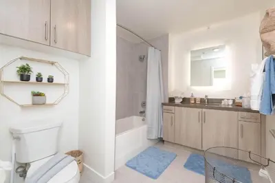 a bathroom with a toilet and a sink at Hollywood Apartment Near Walk of Fame in Los Angeles